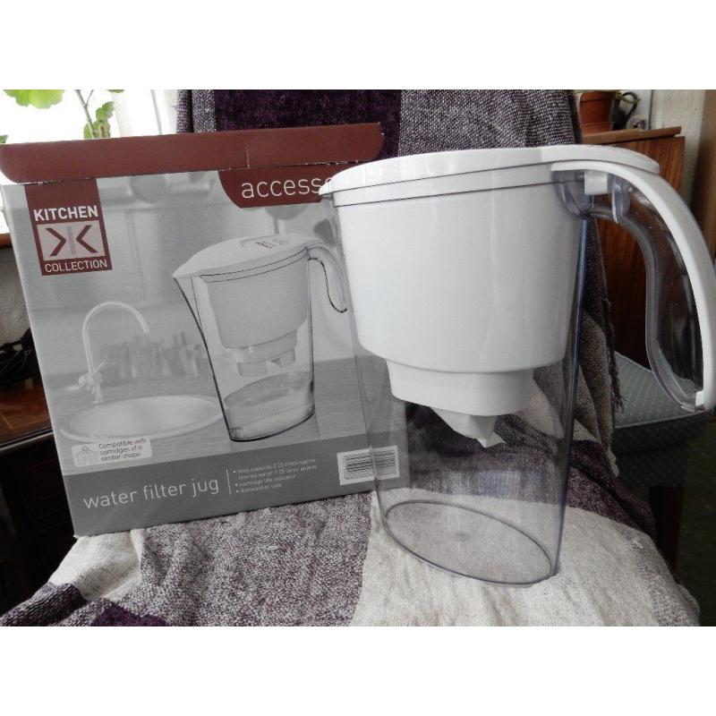 Water Filter Jug . New. Includes 1 free filter.