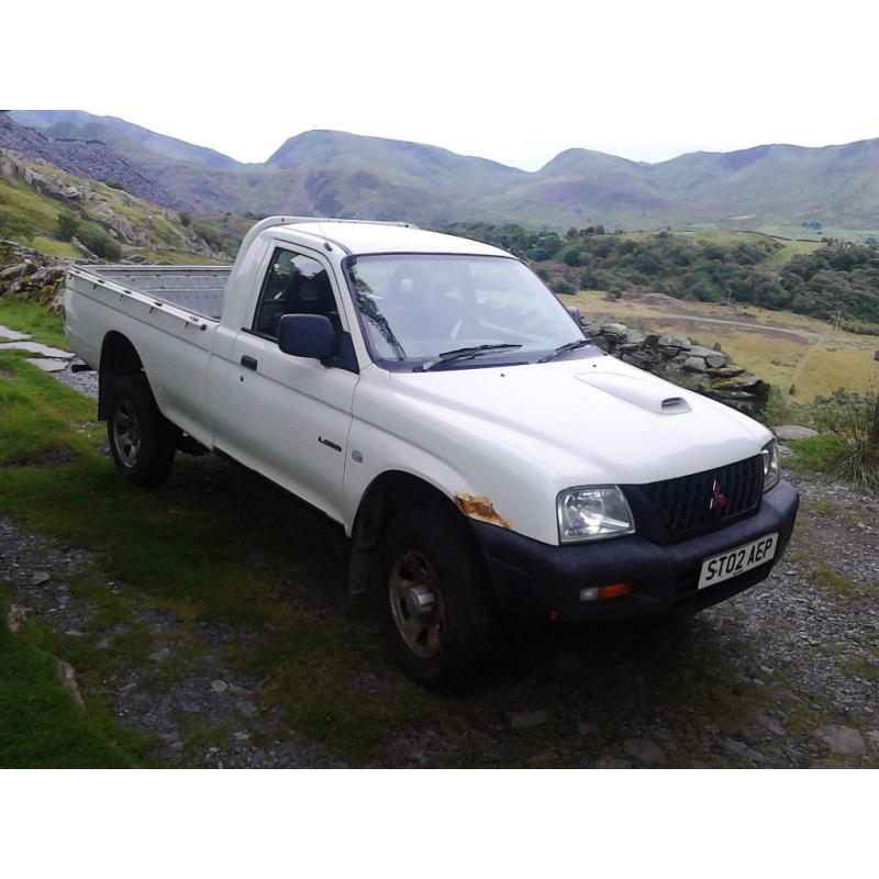 MITSUBISHI L200 2002 2477cc TD LWB 4WD Single cab white.