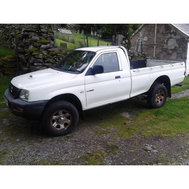 MITSUBISHI L200 2002 2477cc TD LWB 4WD Single cab white.