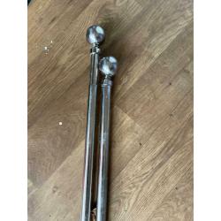 Chrome extendable curtain poles with curtain hooks