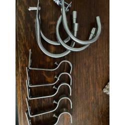 Chrome extendable curtain poles with curtain hooks